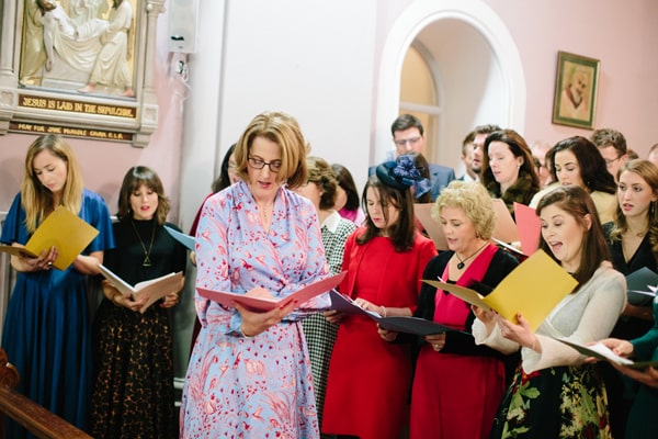 45 family and friends sang All You Need Is Love as the newly-weds walked down the aisle