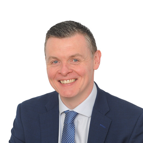 Headshot of Law Society Council member Kevin McElhinneny