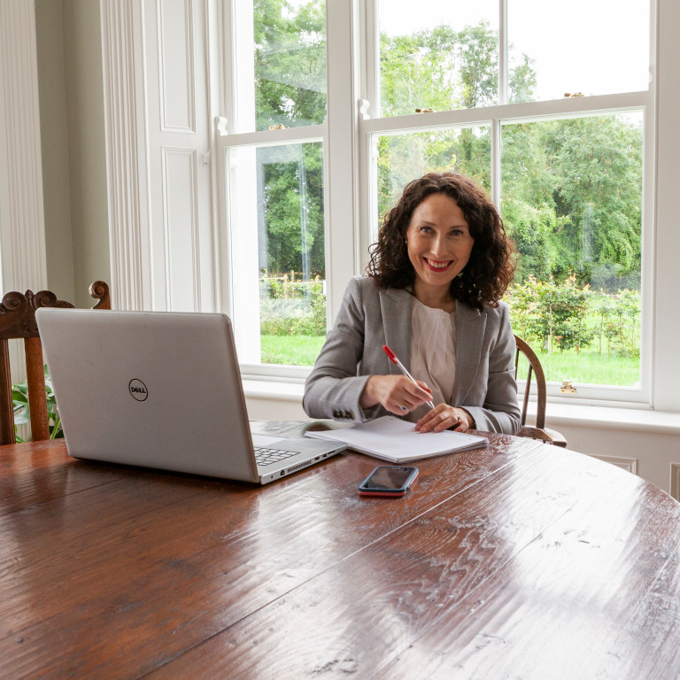 Solicitor working in-office